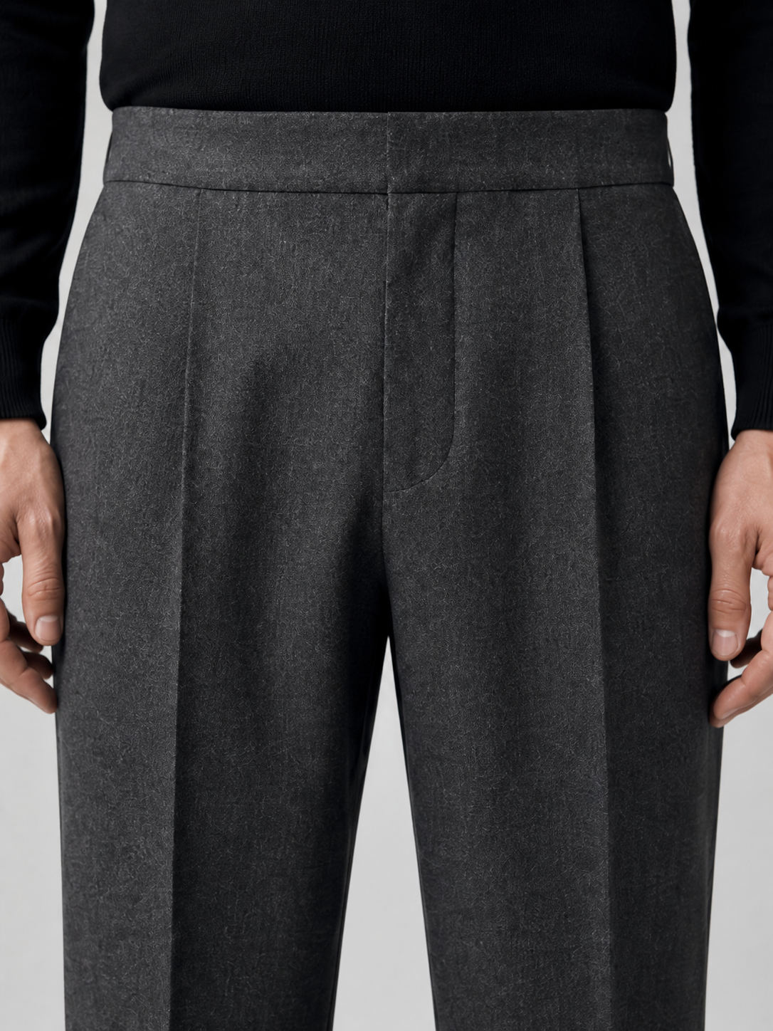 Pleated wool trouser, waistband detail